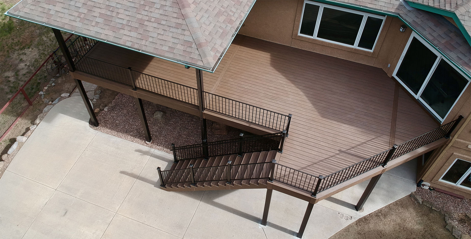 Aerial view of a large deck featuring steel stair framing and composite floor.