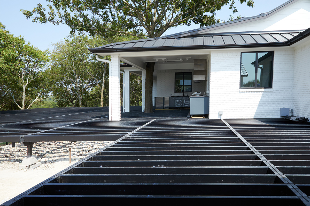 Ground level deck being built with steel deck framing