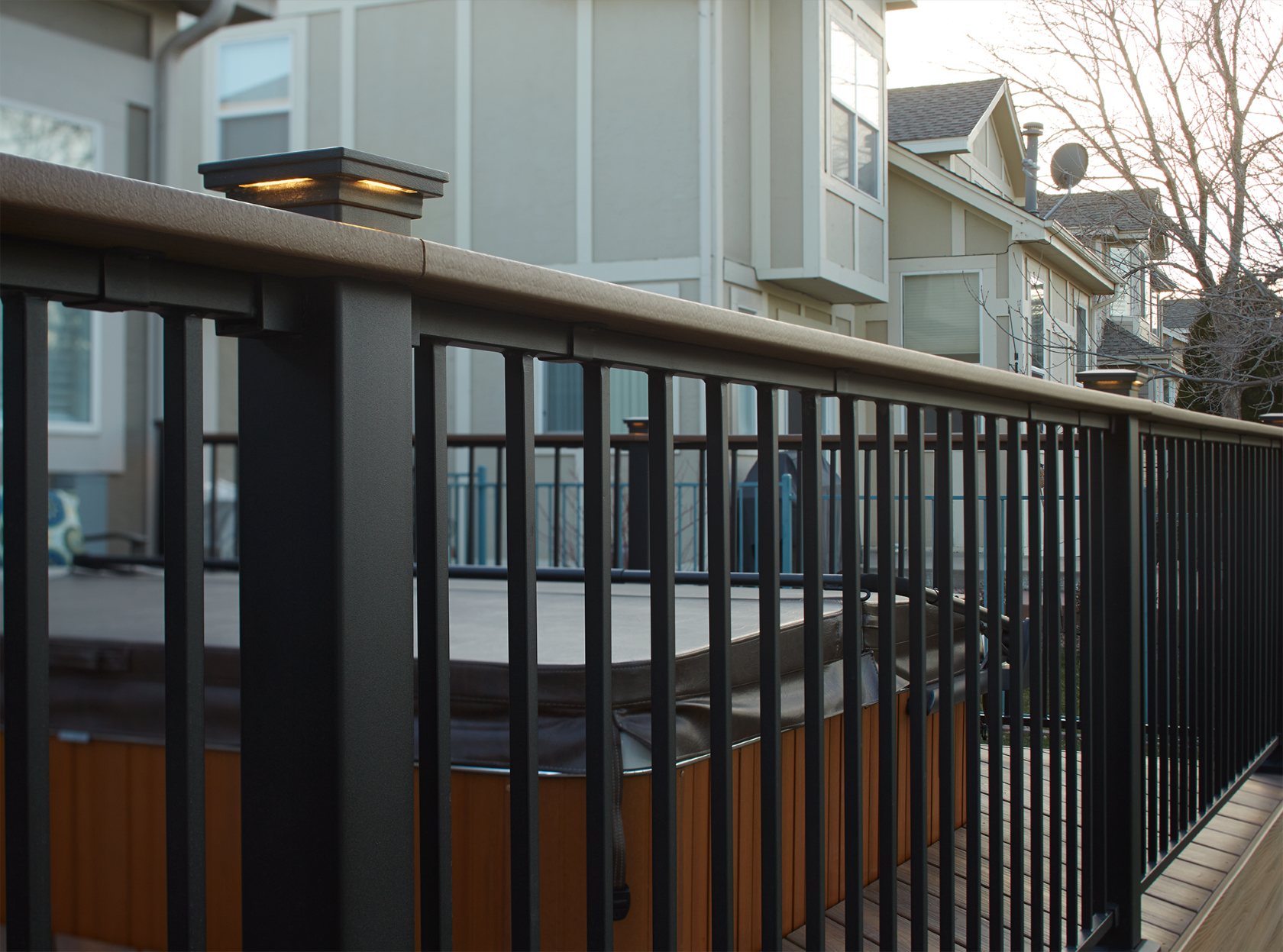 Modern deck post lights installed on railing, enhancing outdoor safety and visibility.