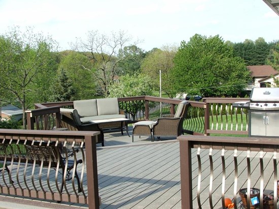 Unique Deck Railing Designs: Curved Balusters | Fortress