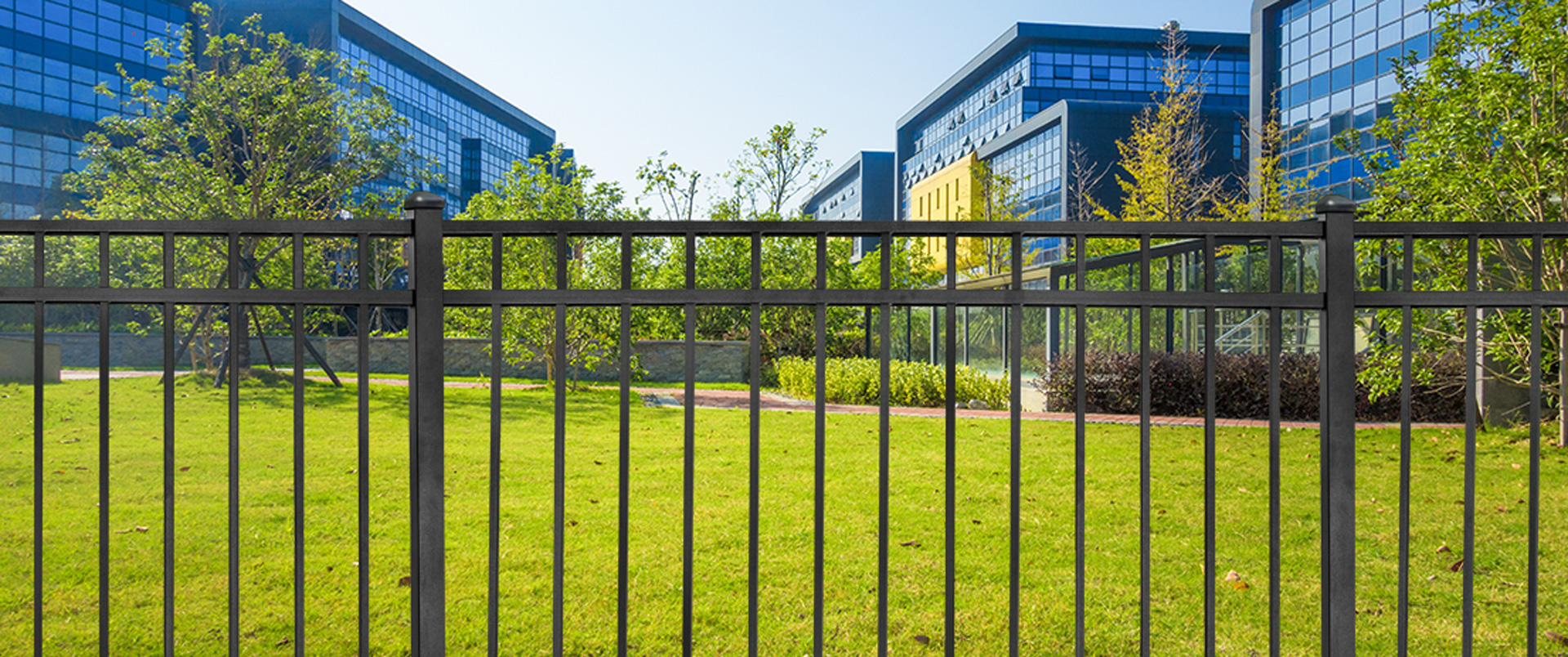 black aluminum commercial fencing on corporate campus