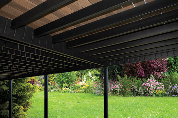 A steel-framed balcony providing weather-resistant foundation and maximizing usable space underneath.