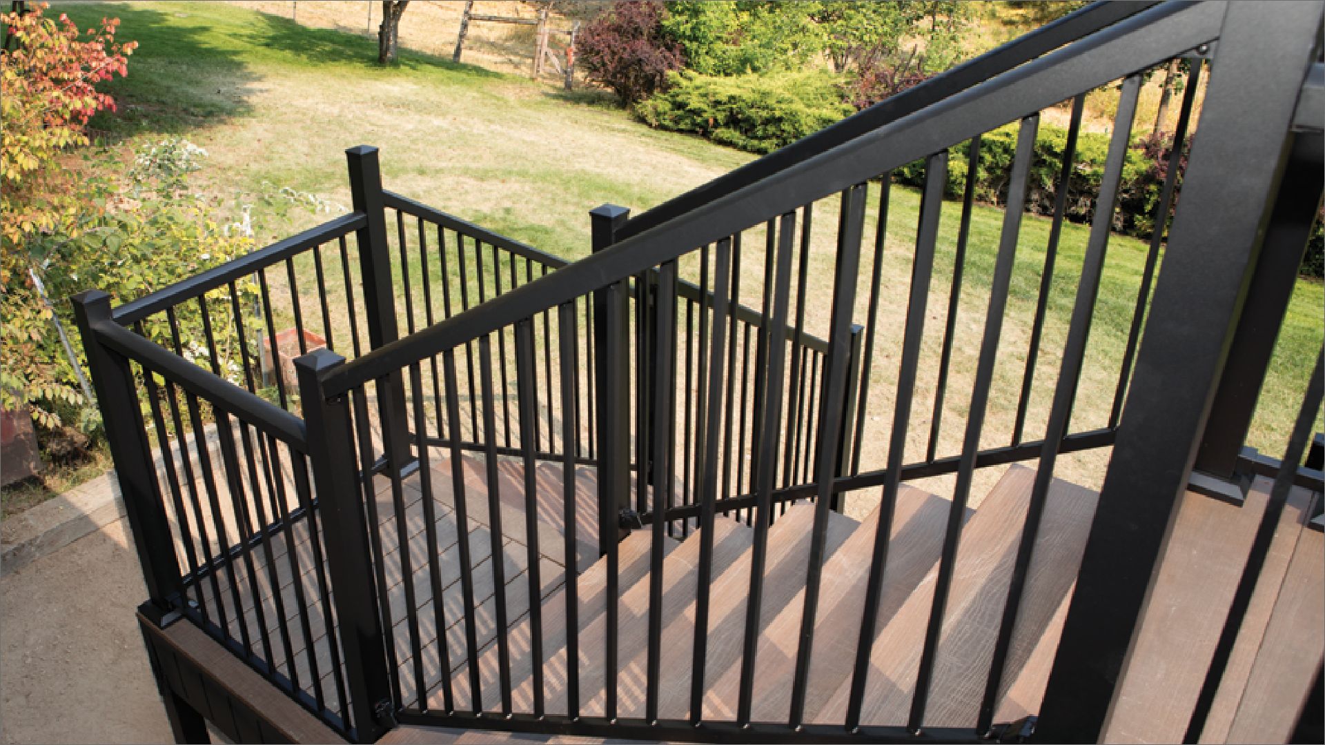 Outdoor deck stairs with railing