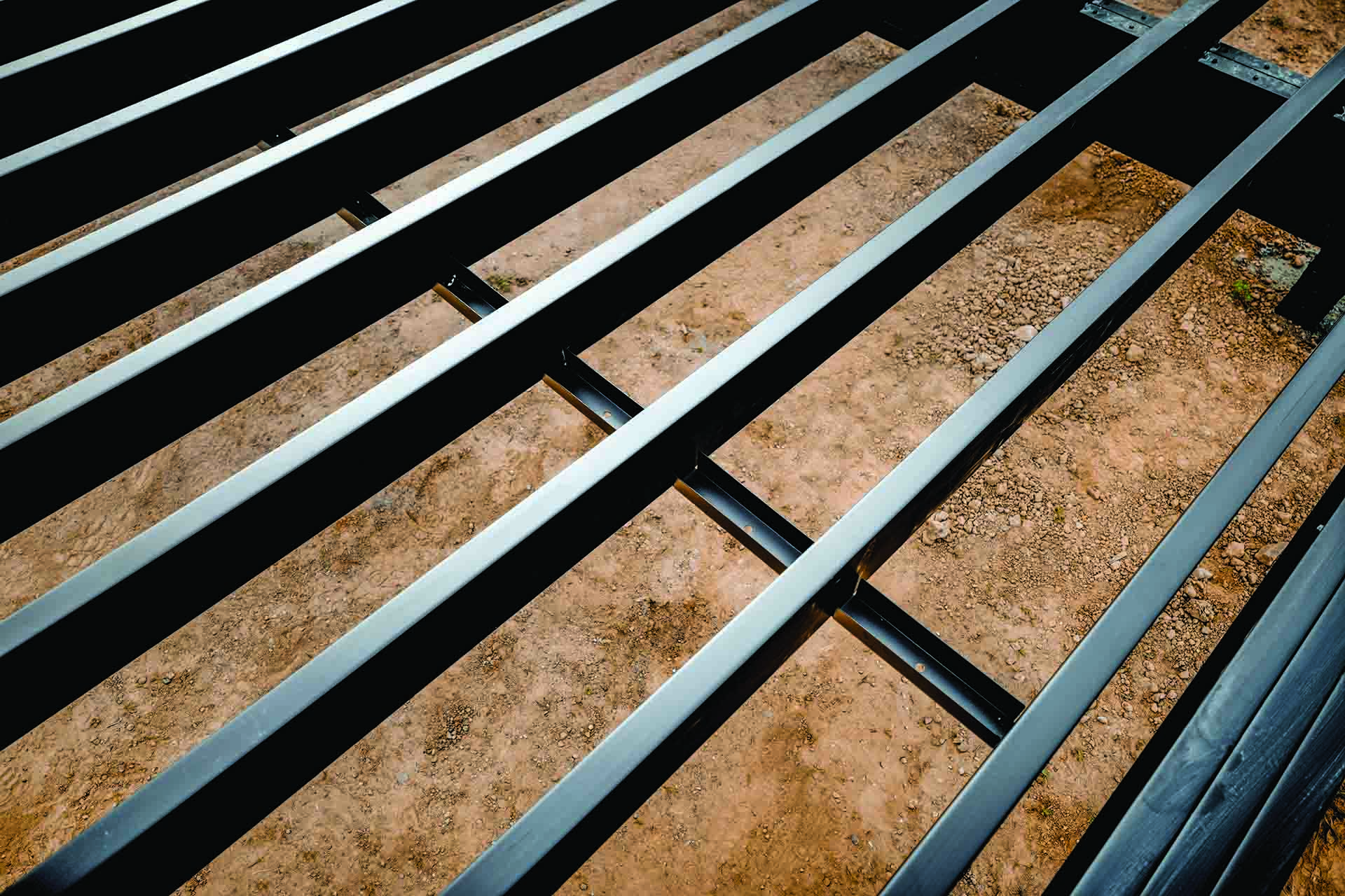 Close-up view of noncombustible steel deck framing.