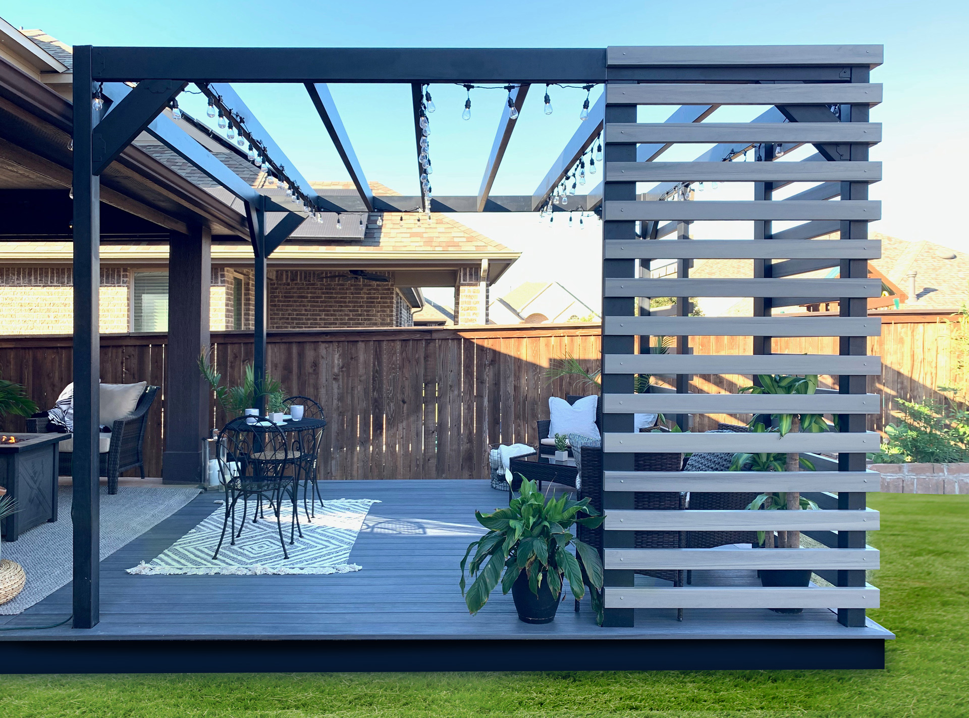 steel pergola on ground level composite deck