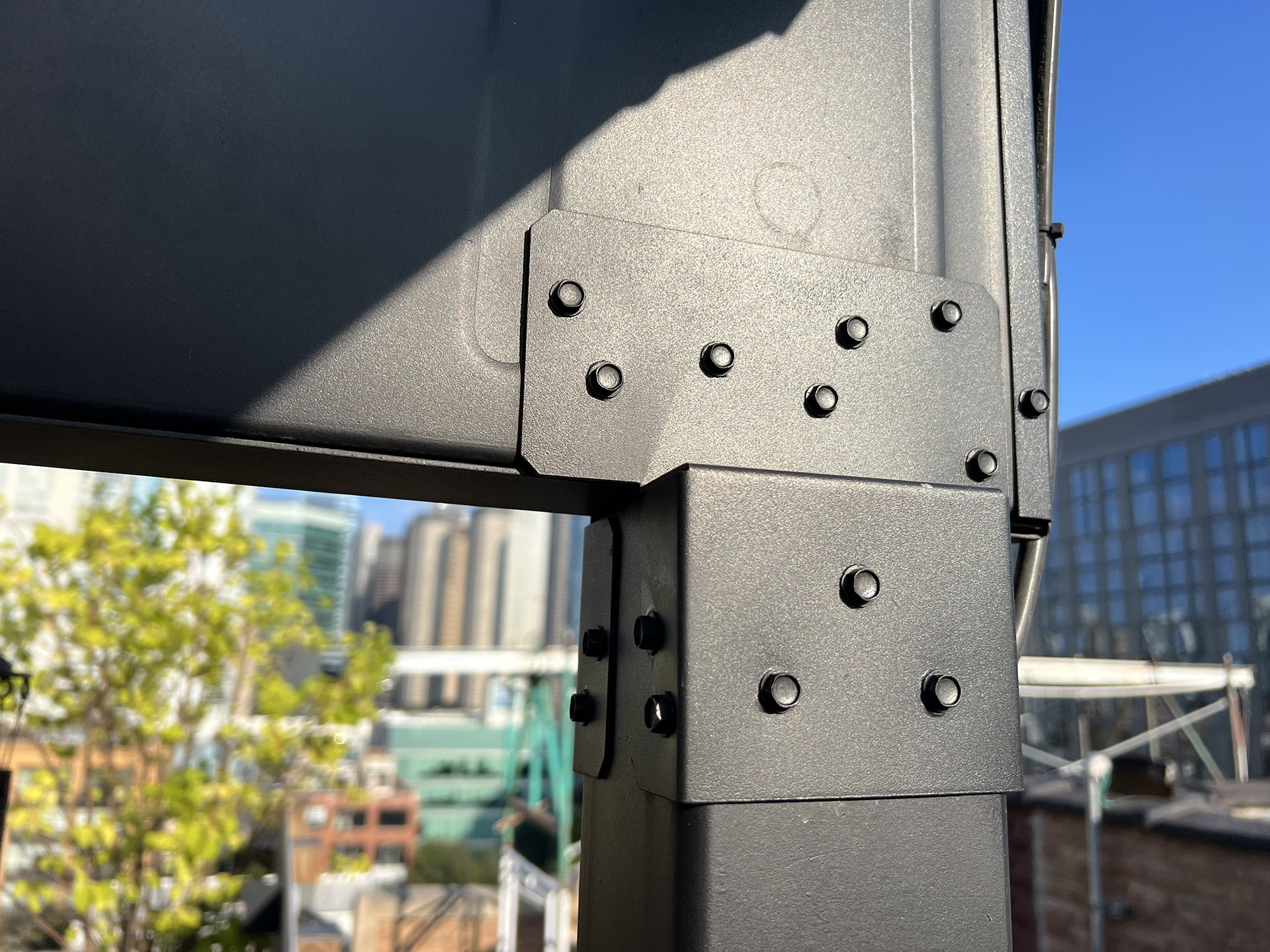 Steel deck framing joints with multiple bolt connections. 