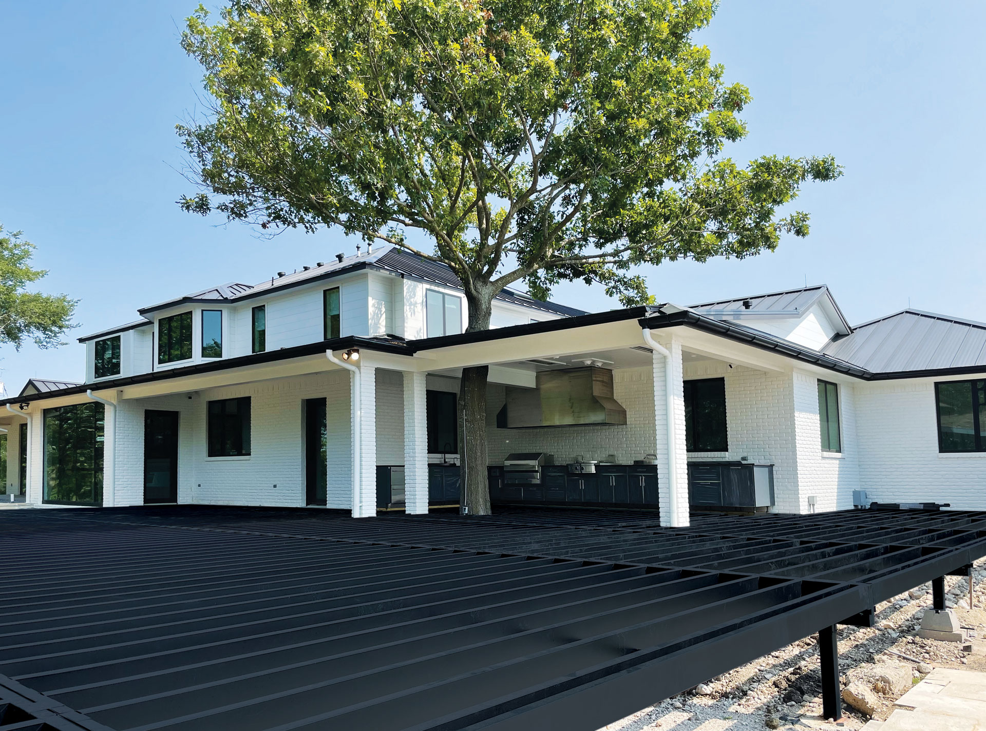 A steel deck frame supports an outdoor kitchen, delivering a fire-resistant,low-maintenance foundation that enhances durability and structural safety.