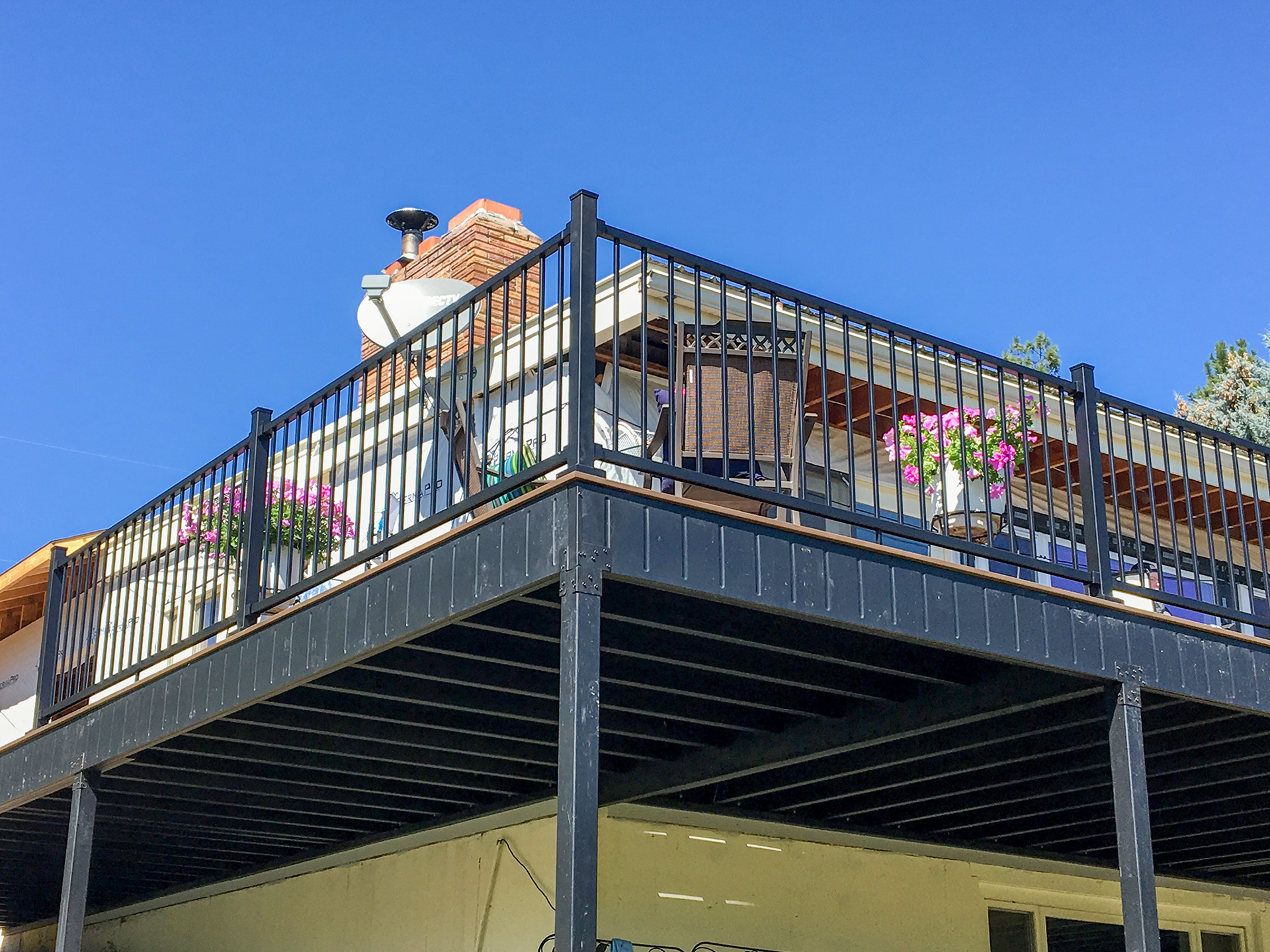 elevated deck is supported by steel deck framing and steel railing