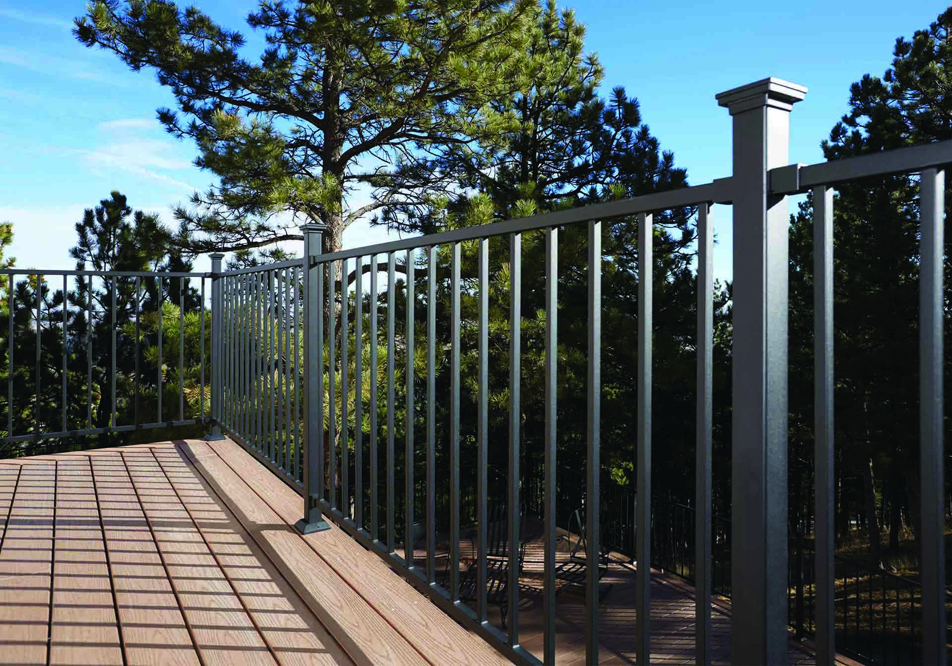 Fe²⁶ steel railing installed on a deck, offering fire-safe and durable outdoor design.